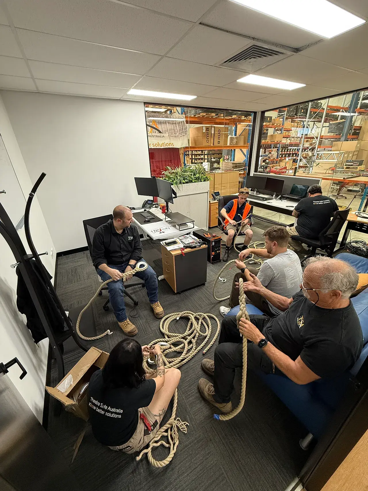 TSA staff working through rope splicing exercises during in-house training